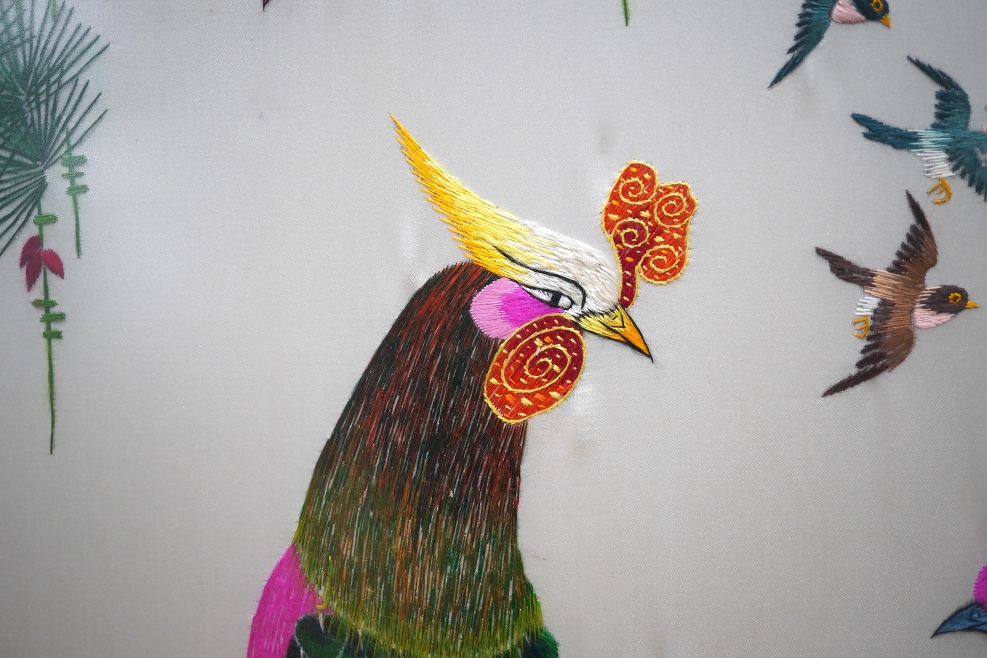 A modern Chinese embroidery on silk depicting birds of paradise, signed with character marks, 120 x 67cm. Condition - good